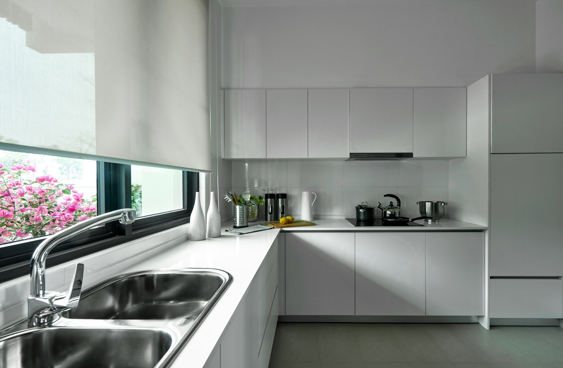 stainless steel sink near window